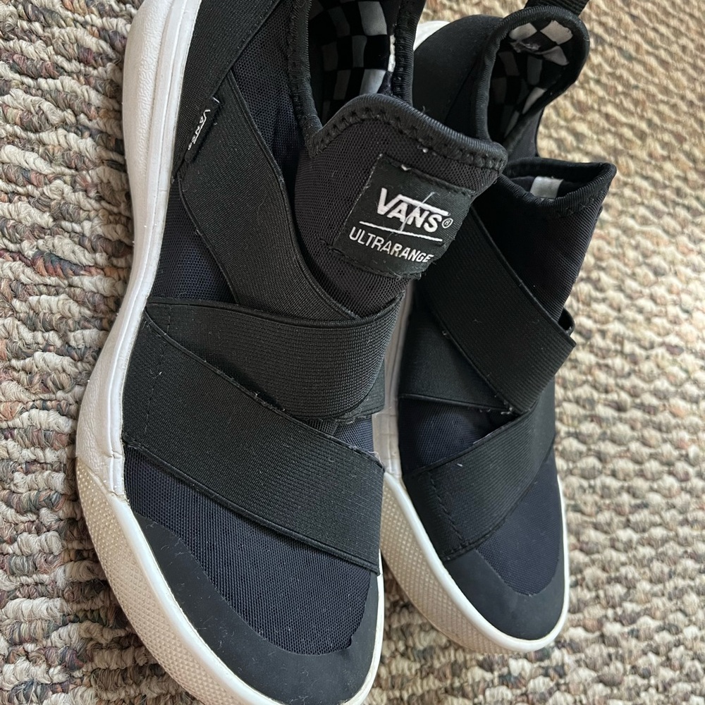 Vans Black and White UltraRange Slip-Ons